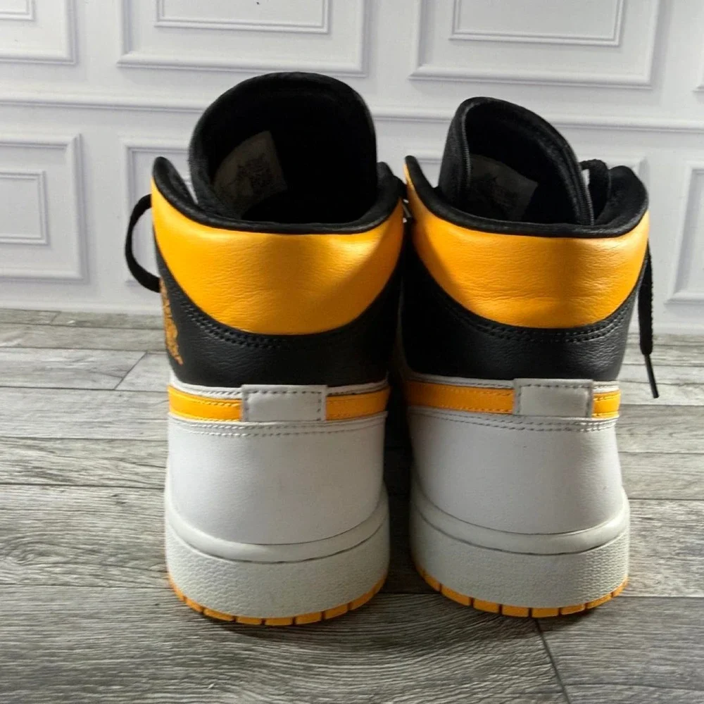 2020 Wmns Air Jordan 1 Mid SE Black, white, and yellow